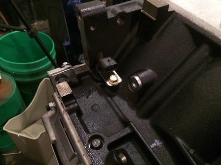The 12560228 crankshaft sensor and 11588712 retainer bolt installed